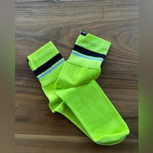 Pair of Rapha Oversocks in “Chartreuse”. Brand new without tags.
